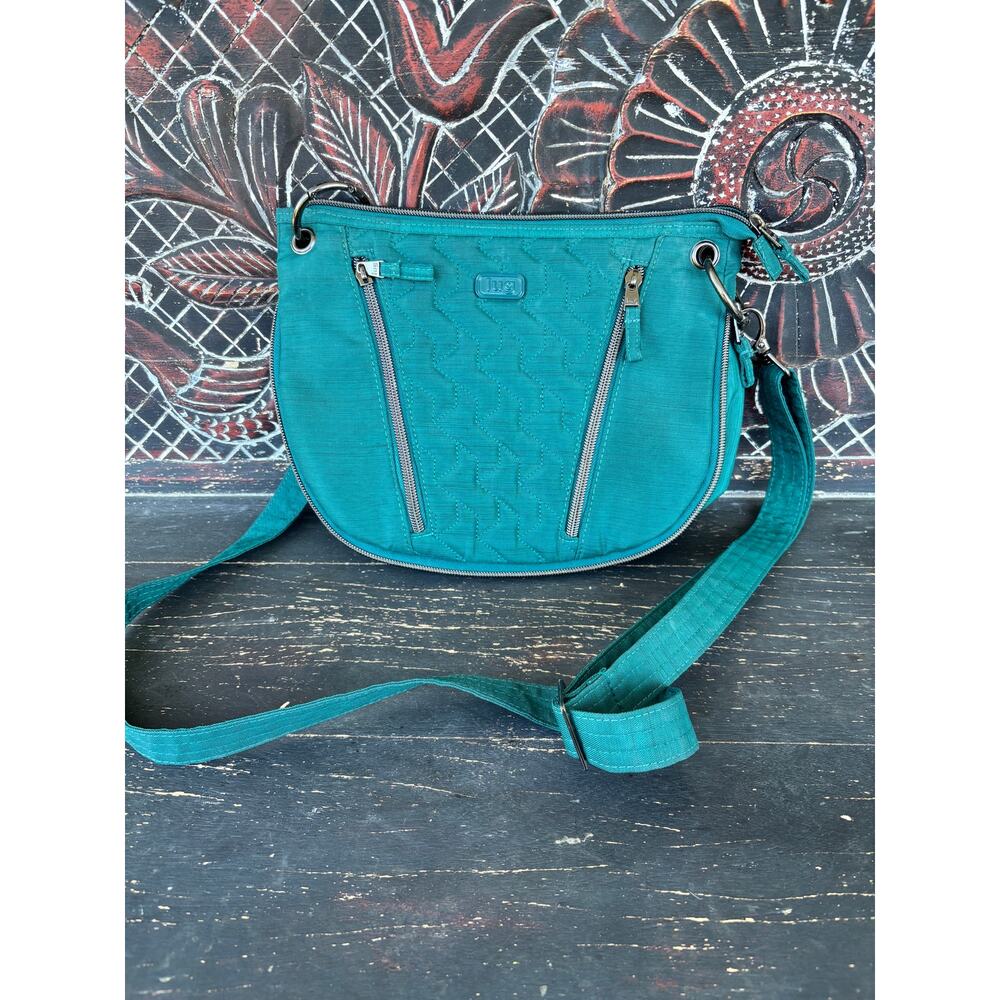 Pre-loved Teal Lug Swivel Convertible Crossbody